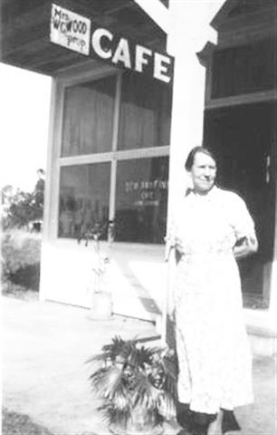 Mabel McCord Wood in front of her cafe, the Dew Drop Inn in Fellsmere FL